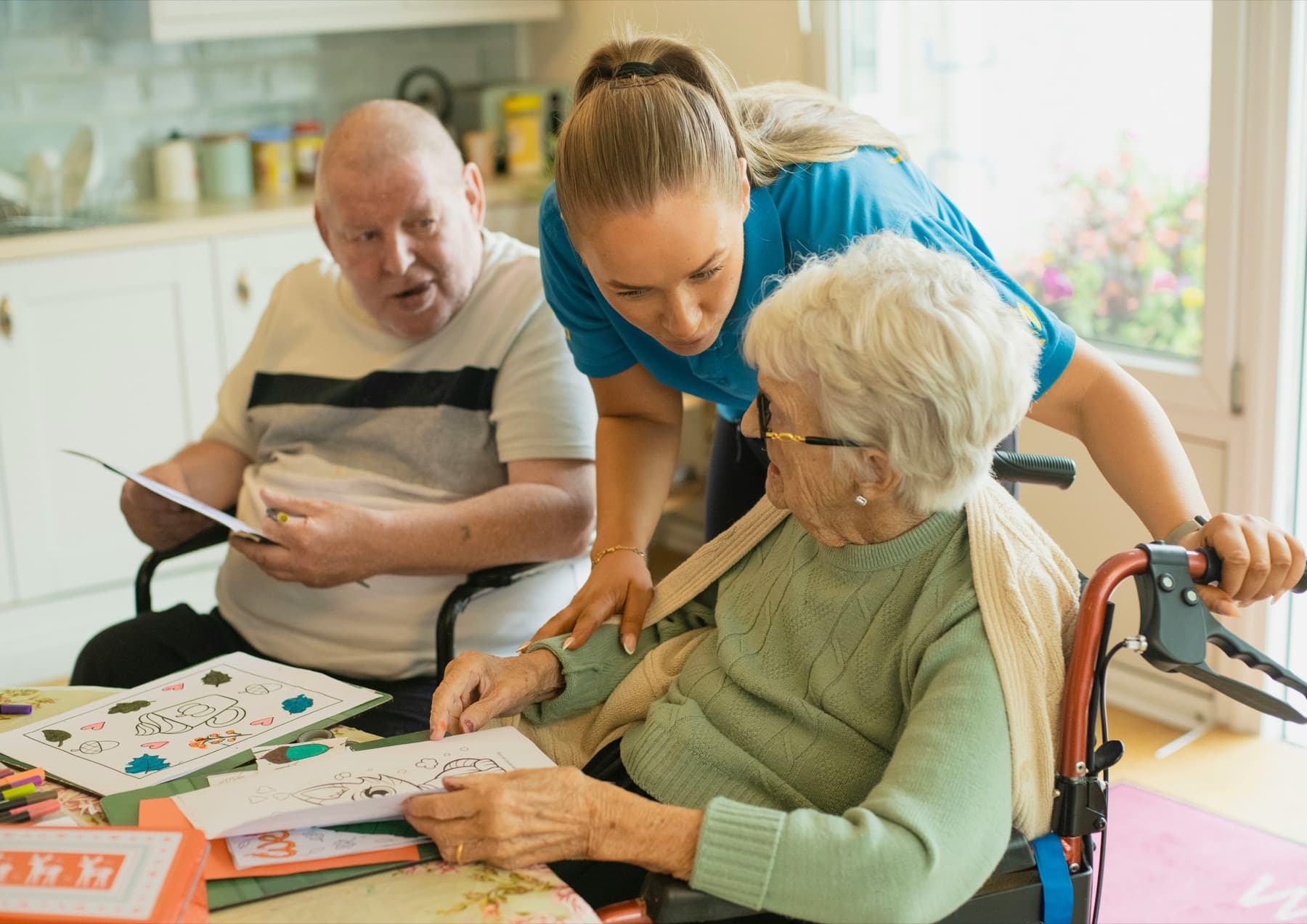 A caregiver spending time with a senior client at home